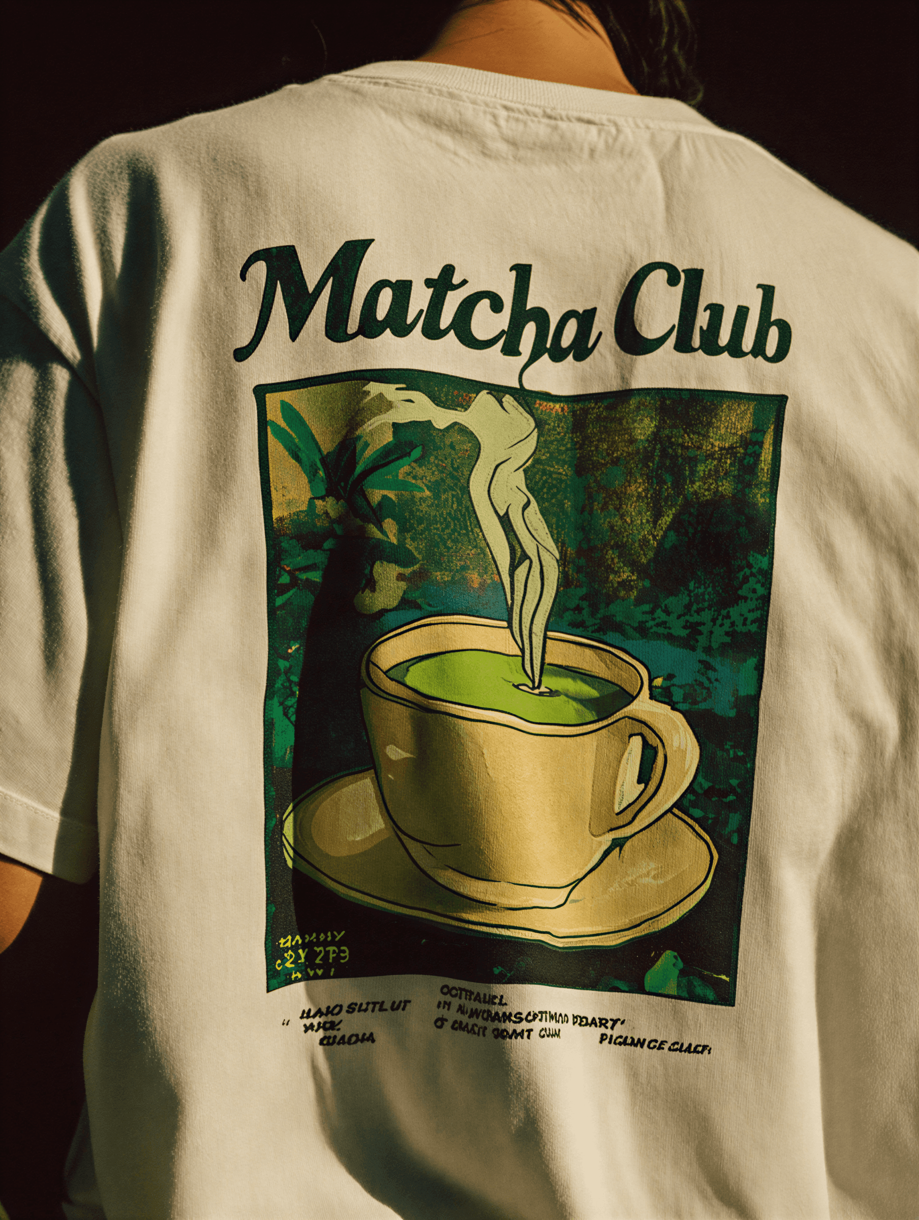 White t-shirt with 'Matcha Club' design featuring a cup of matcha green tea.